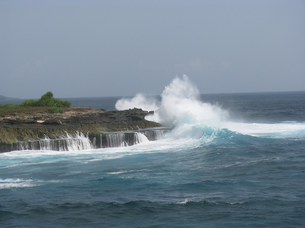 Spray bursting from the cliffs at Devil's Tear